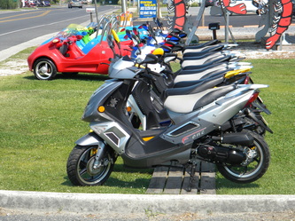 Scooter-N-Spokes - 1 Hour Free! -Cocoa Beach Scooter-N-Spokes- Family Fun Rentals